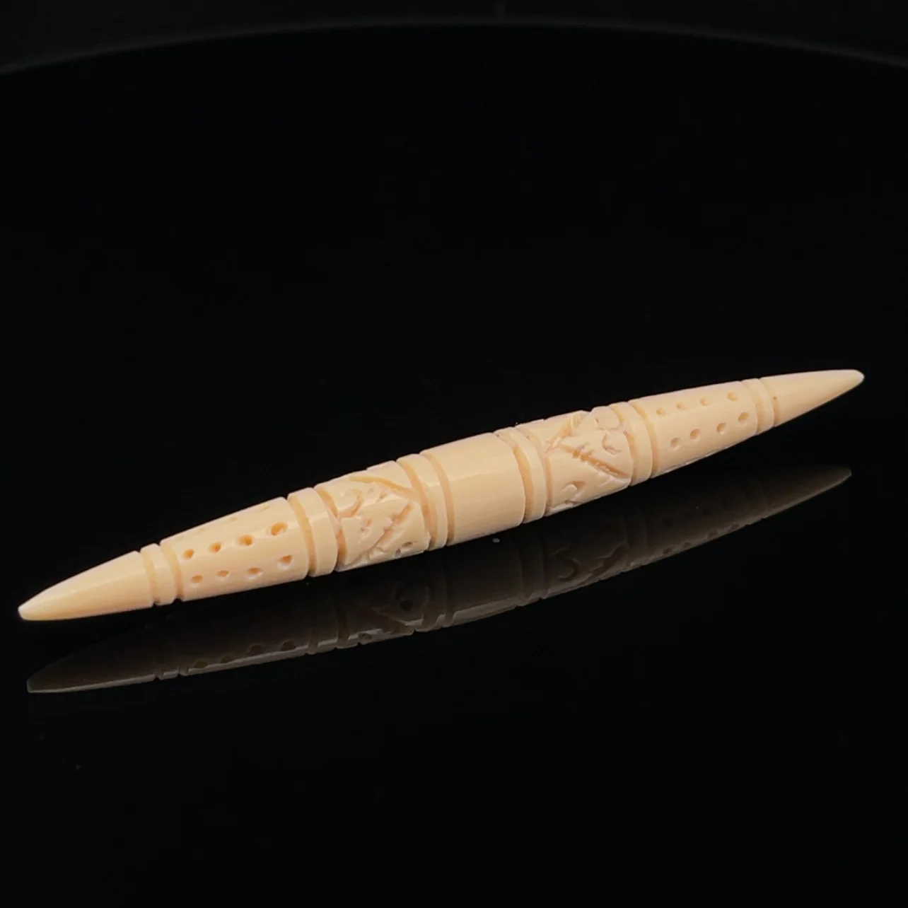 7mm Fossilized Mammoth Carved Septum Spike - Image 2